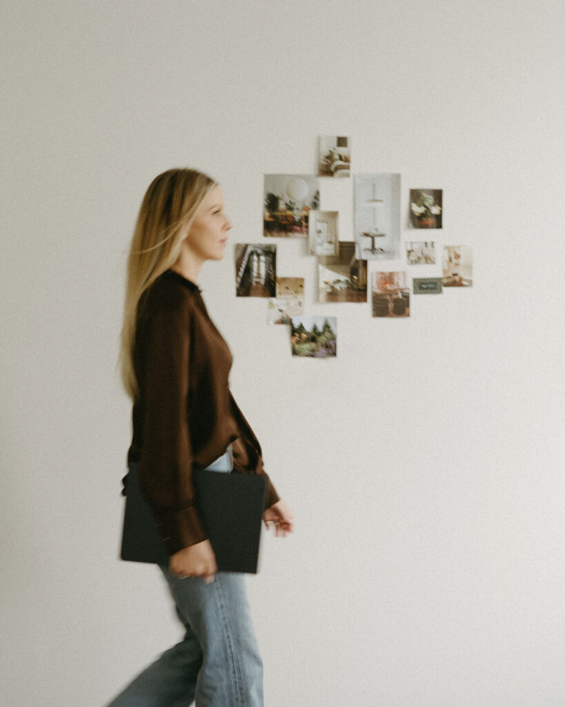 Calgary brand photography with a woman walking in a studio.