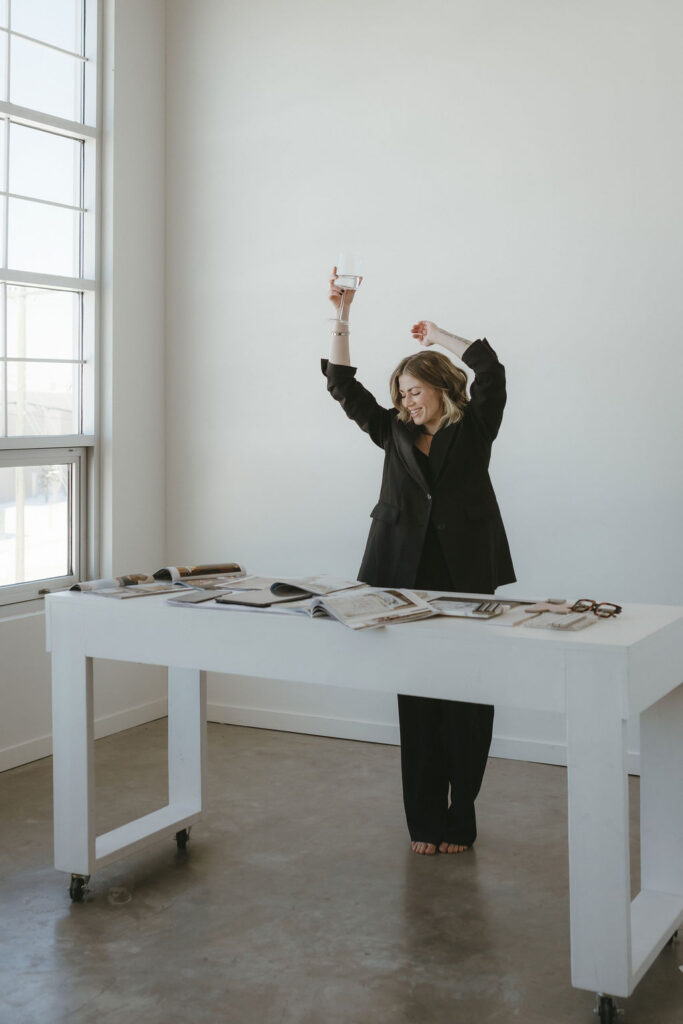 A woman dancing in a studio for her.