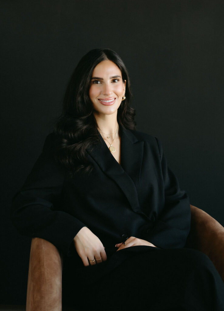 A woman having her portrait taken in a Calgary studio by Calgary headshot photographer, Marwa Hurley.