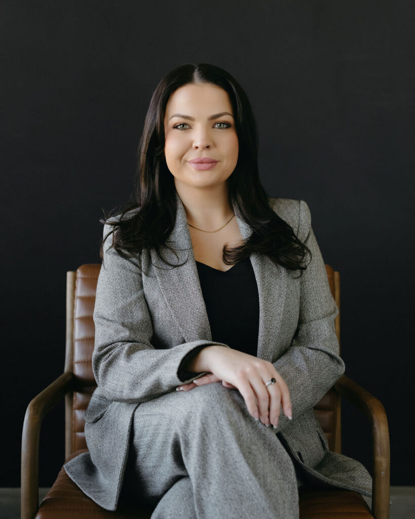 A woman having her headshot taken in a Calgary studio.